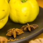 large-yellow-quince-fruits-on-a-ceramic-plate-wit-2025-10-11-08-26-56-utc